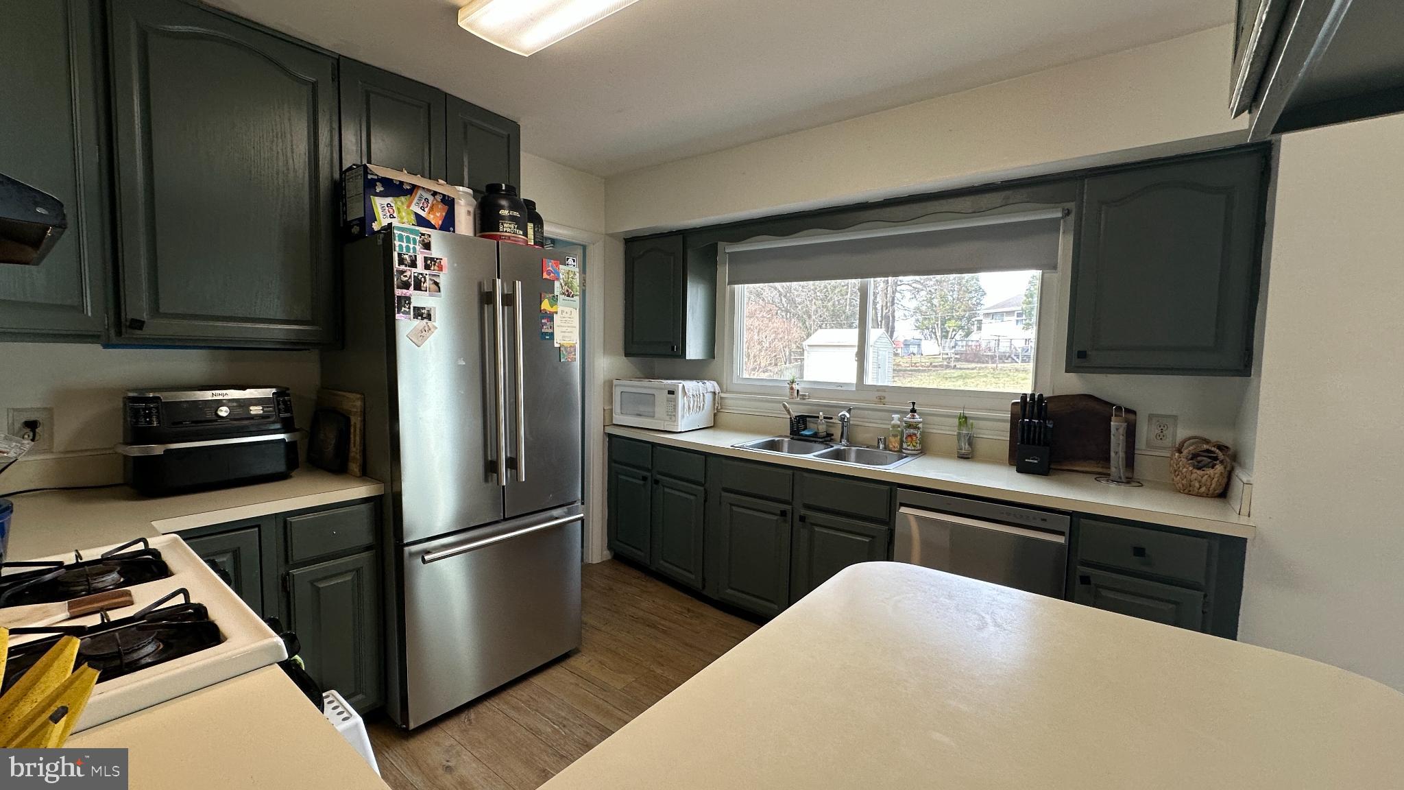 228 Embleton Road Owings Mills, MD 21117 - Photo 3 of 31 Bright and inviting kitchen with modern touches.