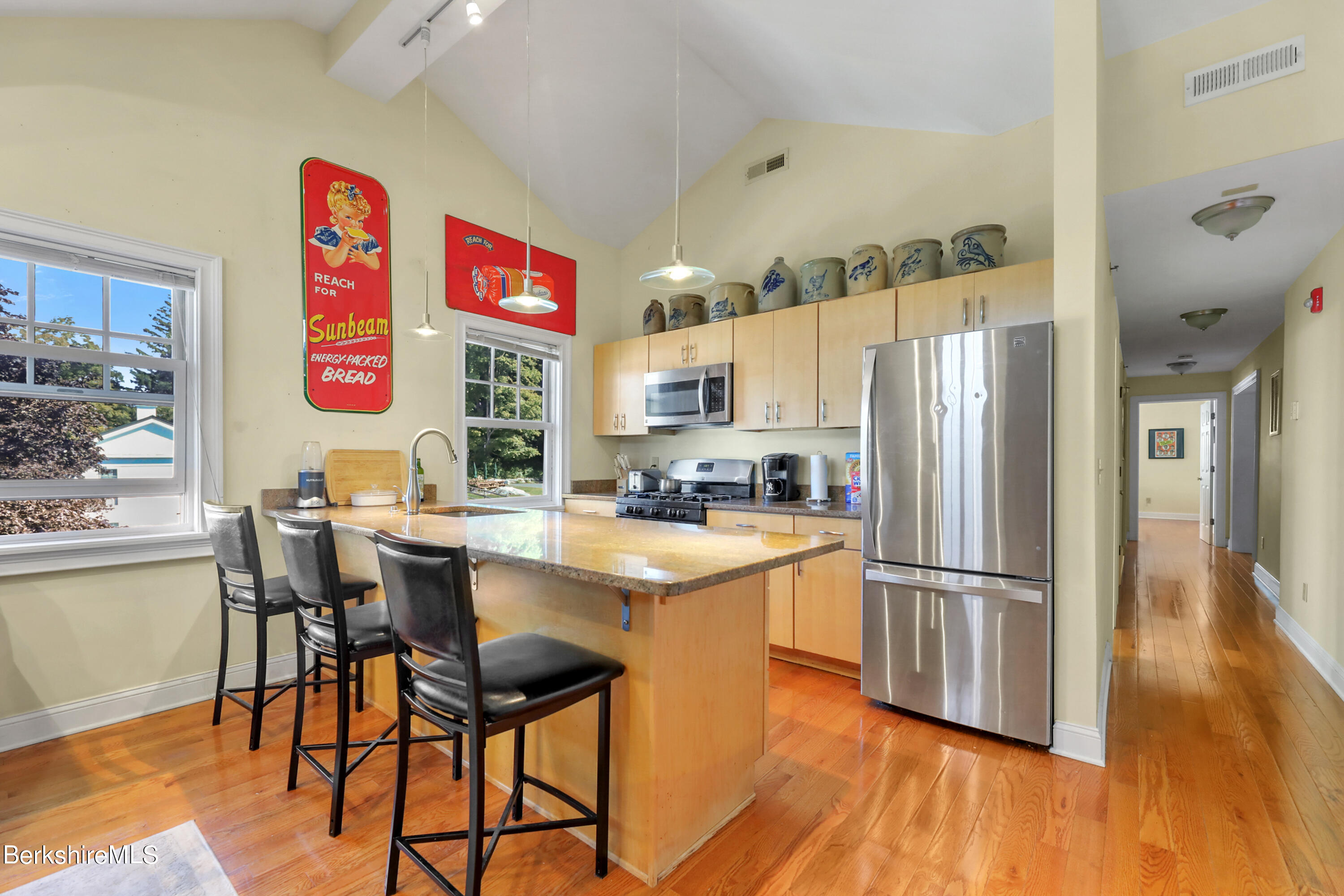 29 Main Street West Stockbridge, MA 01266 - Photo 40 of 51 a kitchen with stainless steel appliances granite countertop a refrigerator and a stove top oven