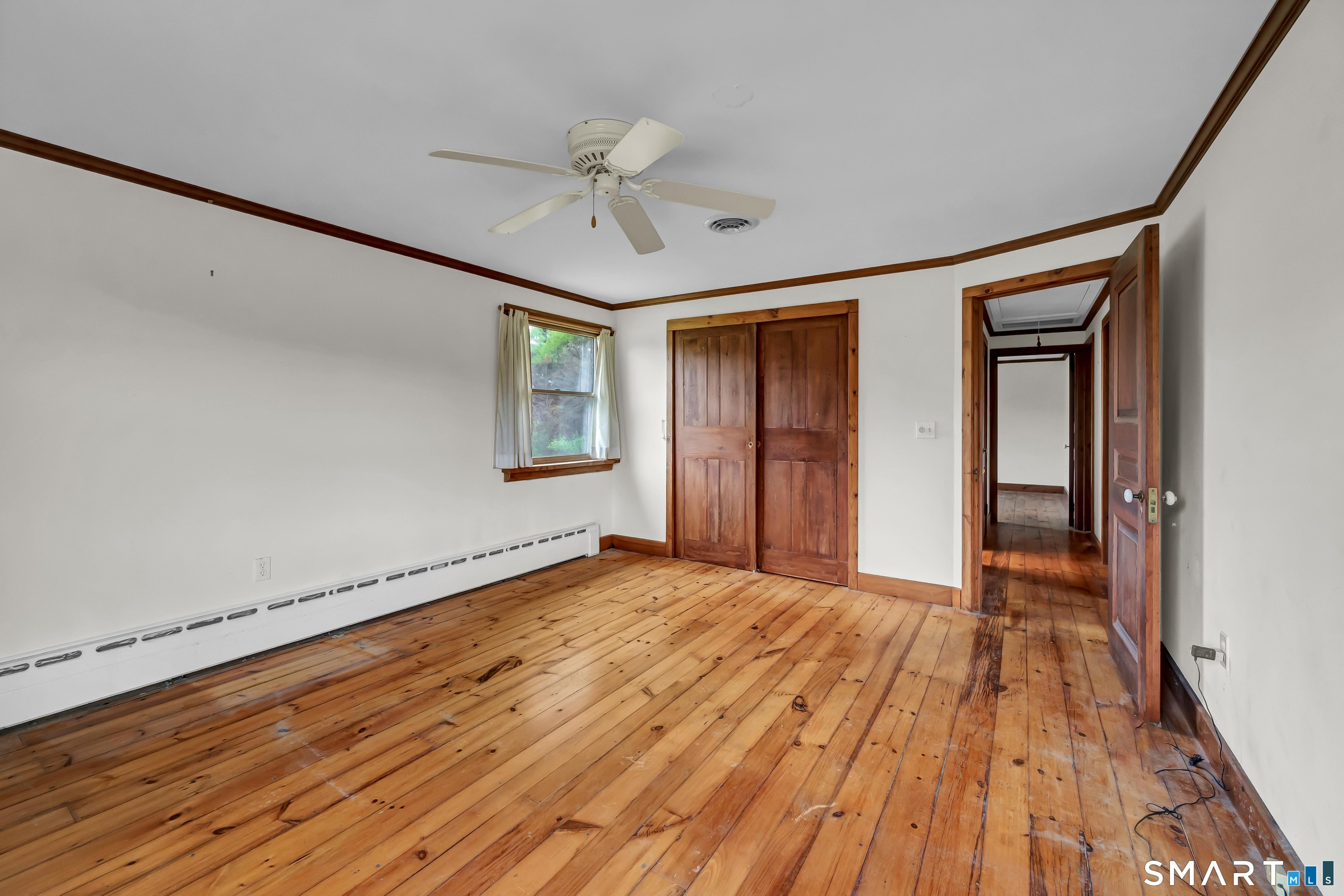 139 West Side Road Goshen, CT 06756 - Photo 10 of 17 wooden floor in an empty room with a window