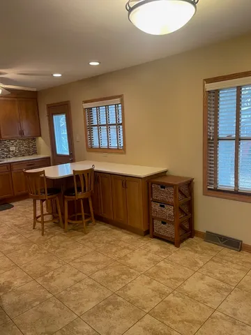 a room with furniture and window