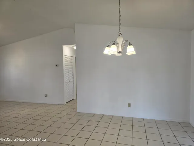 a view of an empty room with window