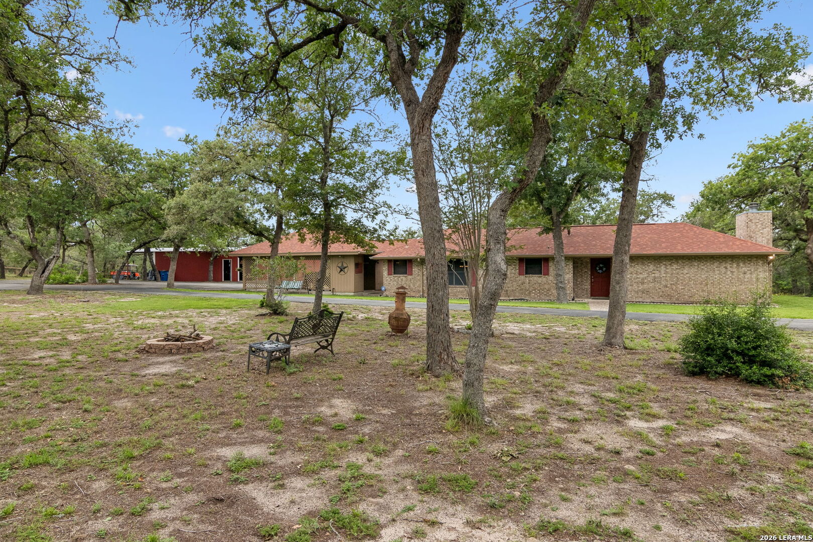 188 Guadalupe Ranch Lane Seguin, TX 78155 - Photo 11 of 56 a backyard of a house with table and chairs