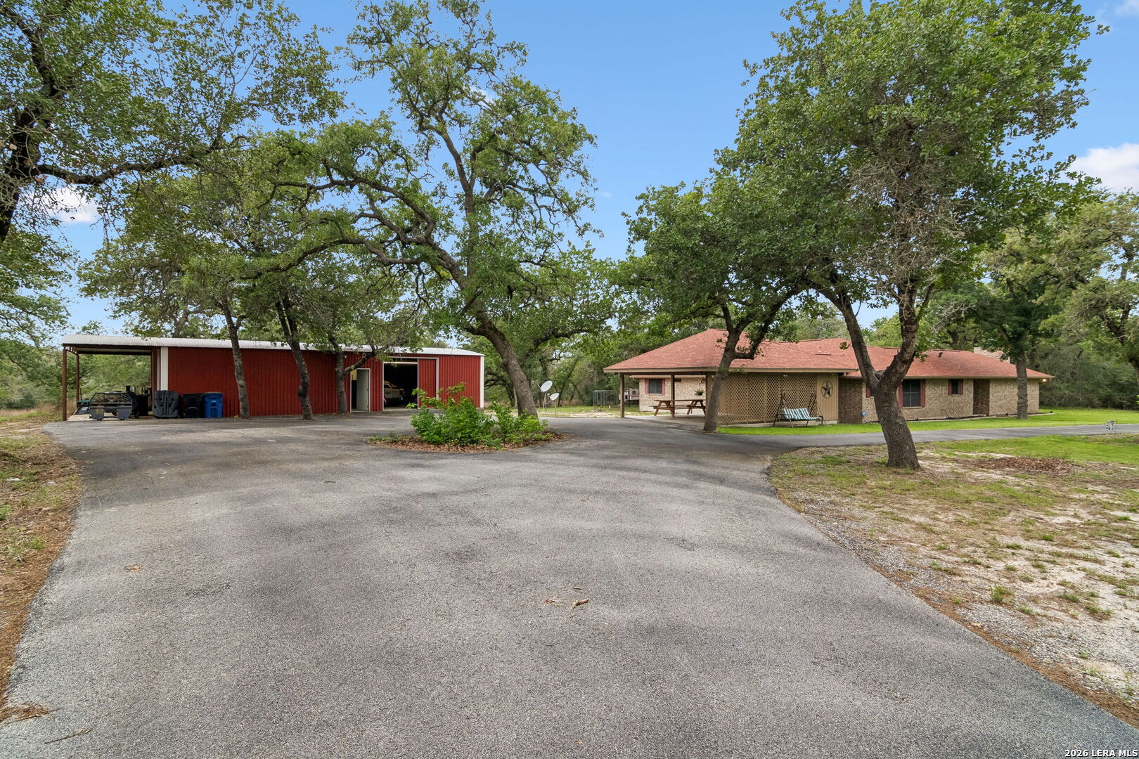 188 Guadalupe Ranch Lane Seguin, TX 78155 - Photo 14 of 56 a front view of a house with a yard and tree