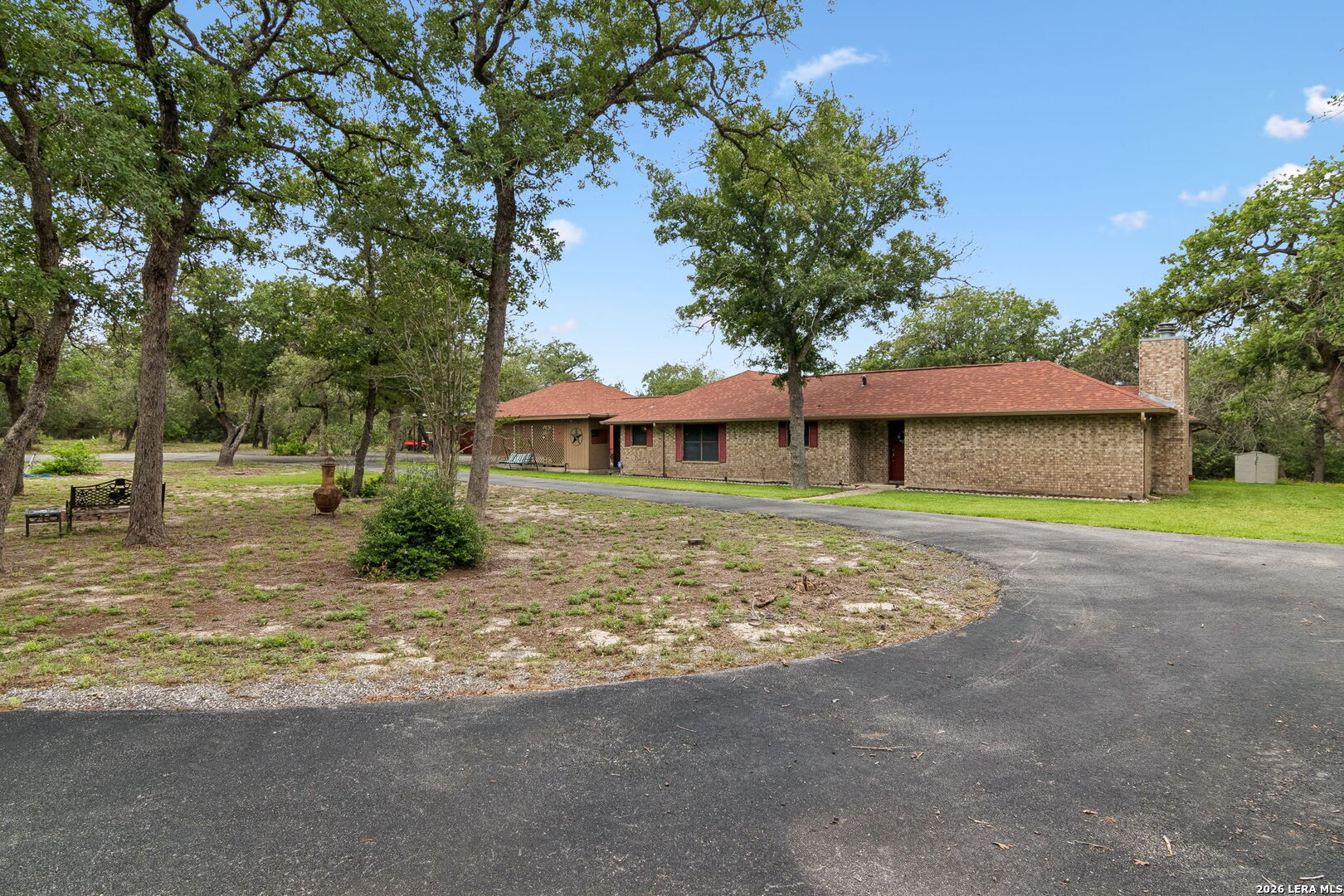 188 Guadalupe Ranch Lane Seguin, TX 78155 - Photo 19 of 56 a front view of a house with a garden