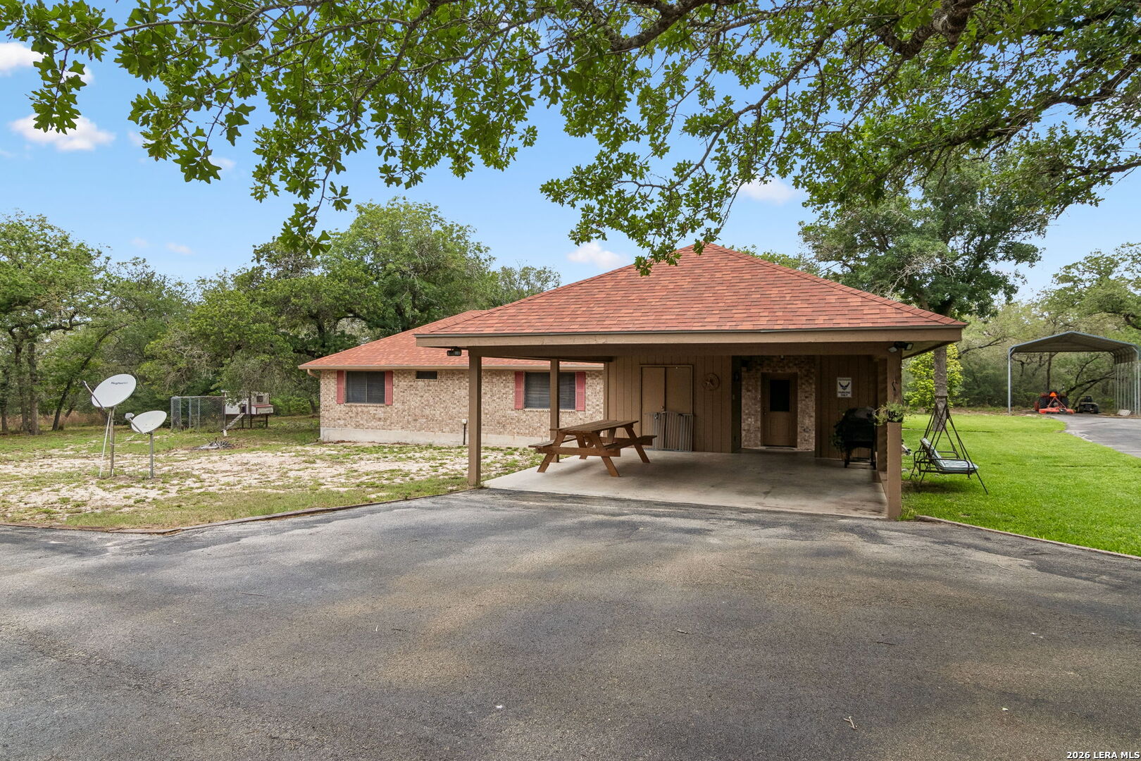 188 Guadalupe Ranch Lane Seguin, TX 78155 - Photo 22 of 56 a front view of a house with garden