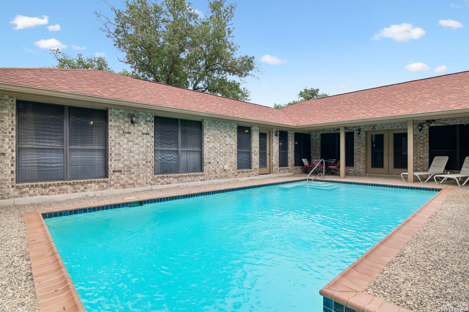 188 Guadalupe Ranch Lane Seguin, TX 78155 - Photo 26 of 56 a view of a house with swimming pool and a yard