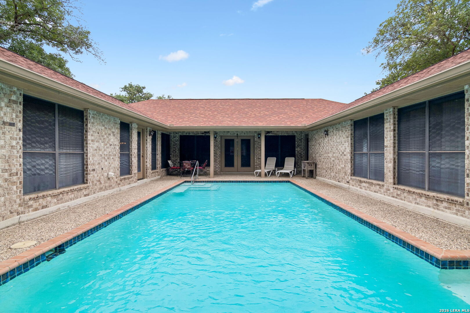 188 Guadalupe Ranch Lane Seguin, TX 78155 - Photo 28 of 56 a view of a house with sitting area and yard