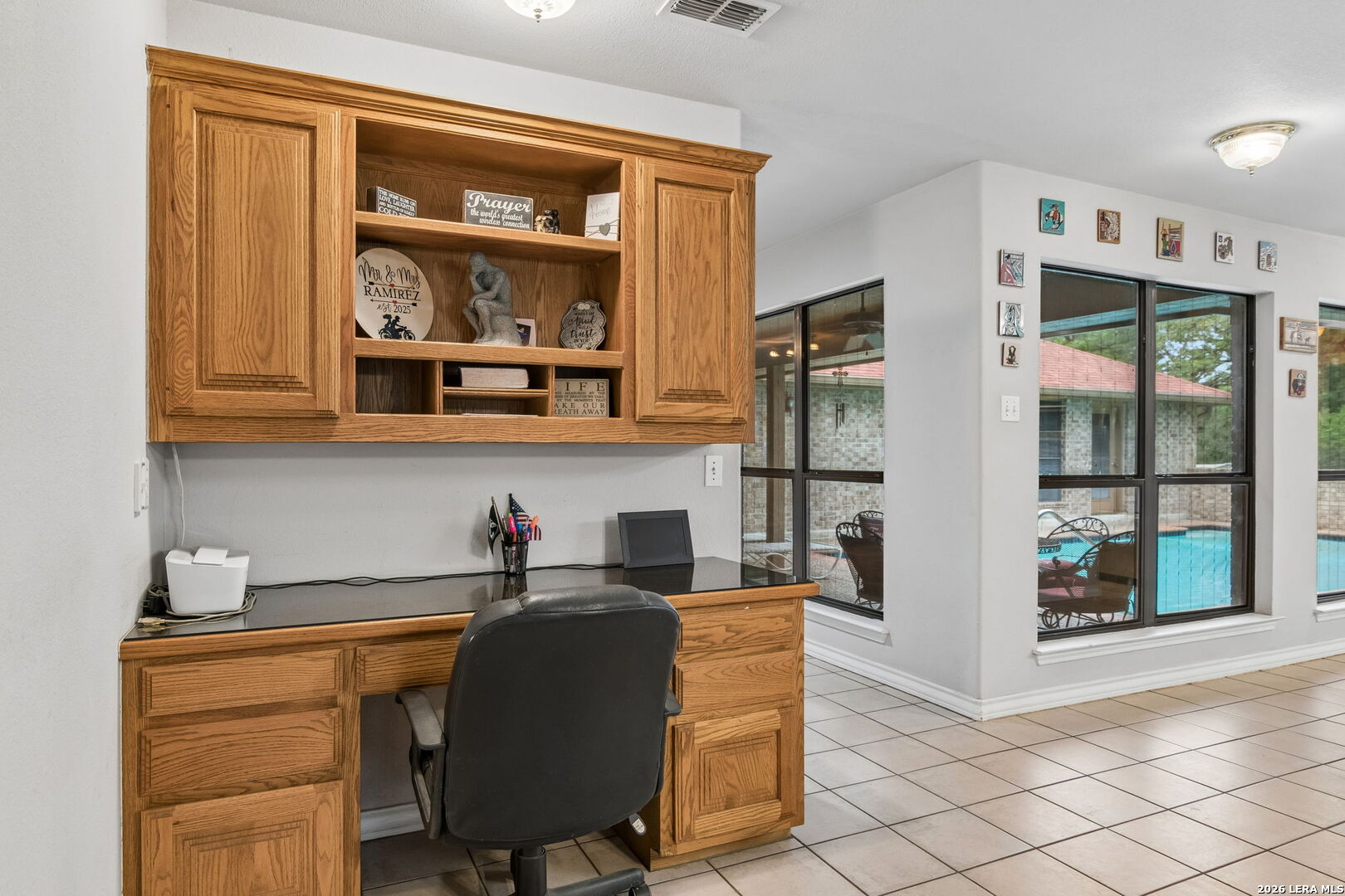 188 Guadalupe Ranch Lane Seguin, TX 78155 - Photo 46 of 56 a view of a workspace with furniture and a window