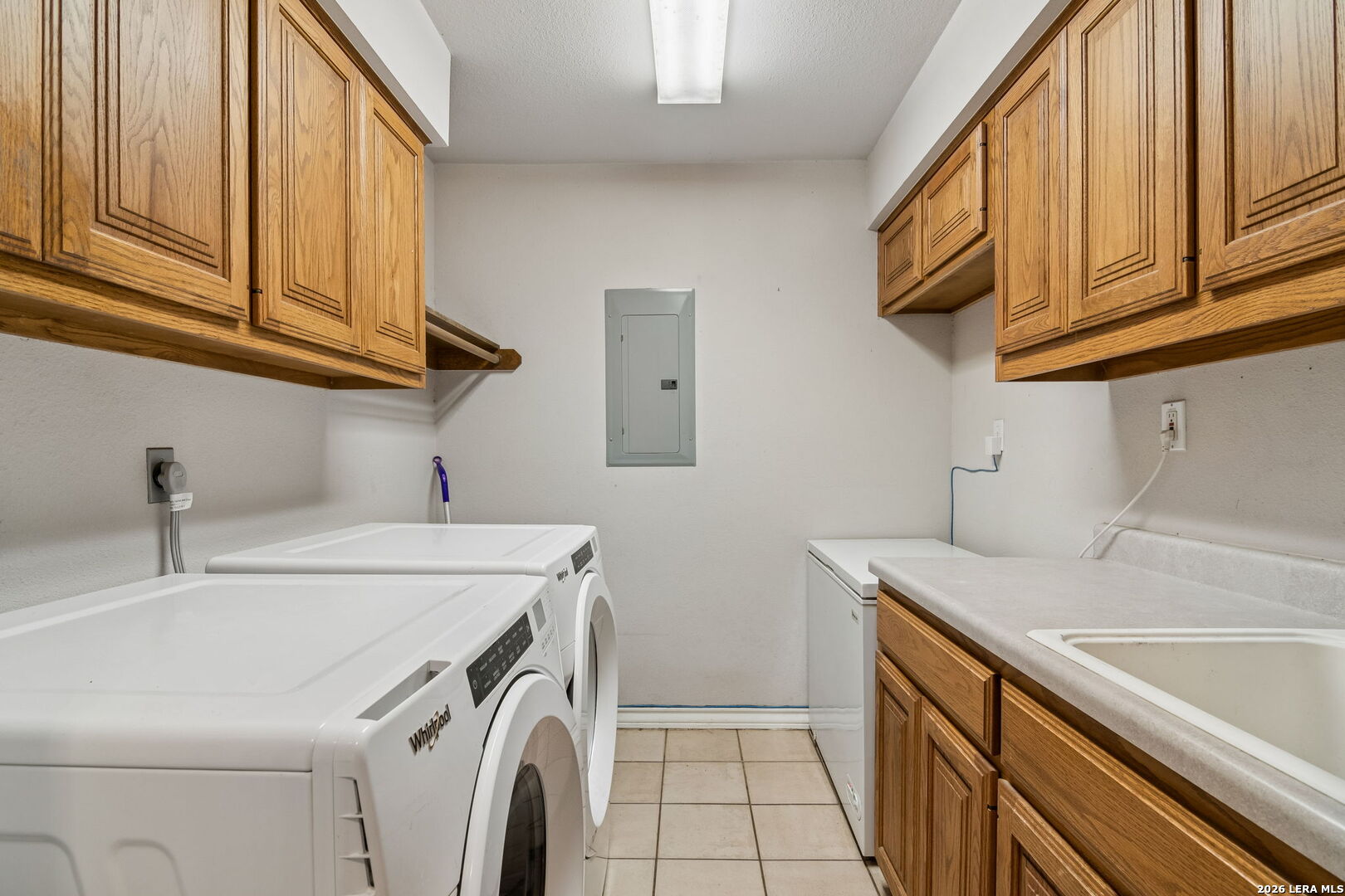 188 Guadalupe Ranch Lane Seguin, TX 78155 - Photo 49 of 56 a utility room with a sink washer and dryer
