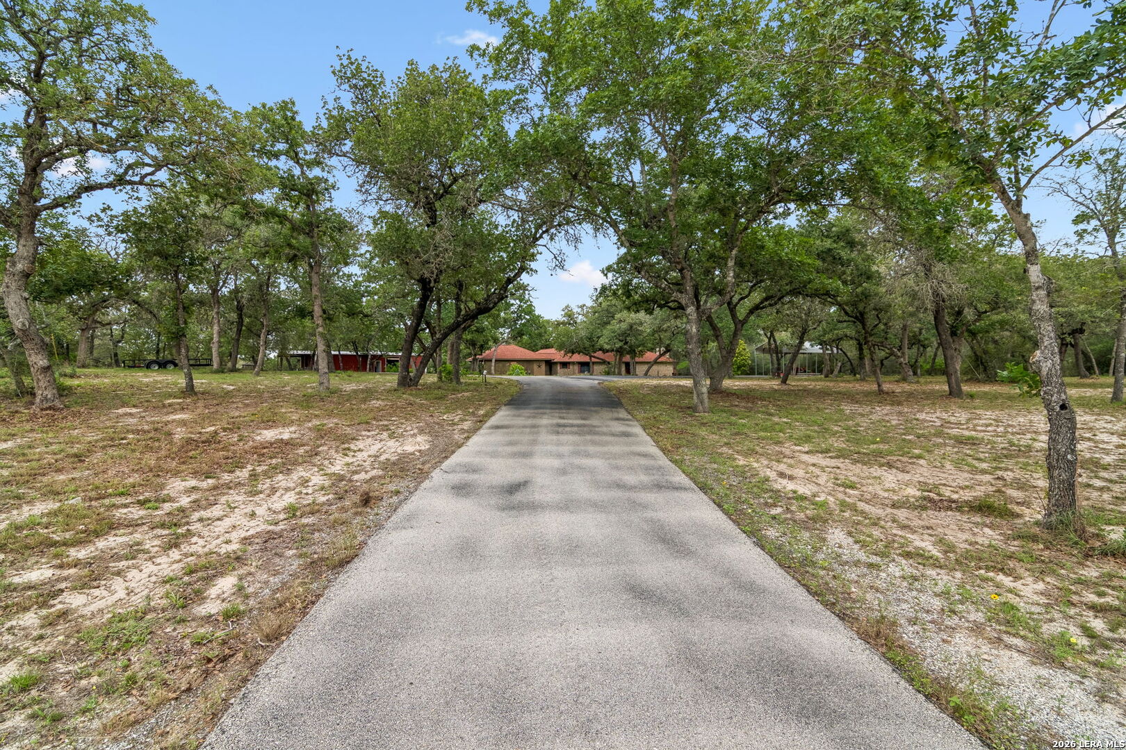 188 Guadalupe Ranch Lane Seguin, TX 78155 - Photo 10 of 56 a view of a yard with plants and trees