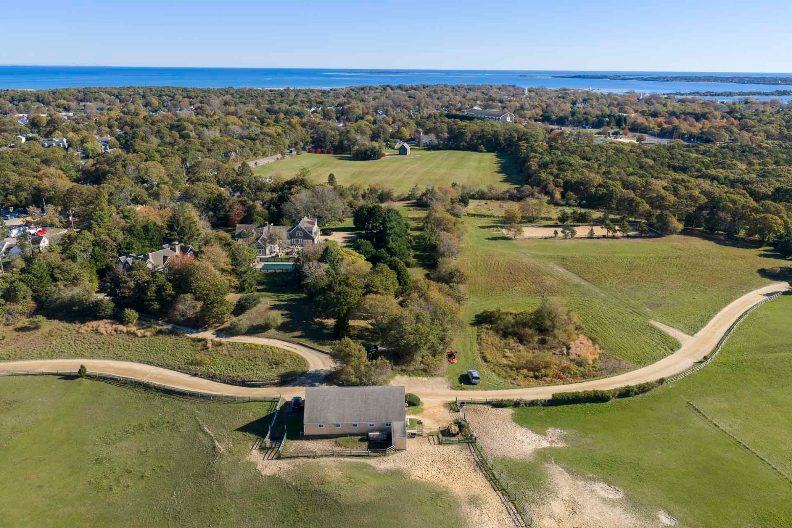 5 Louis Field Road Edgartown, MA 02539 - Photo 5 of 9 an aerial view of a house with a lake view