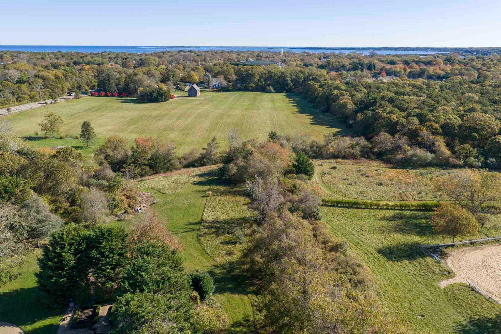 5 Louis Field Road Edgartown, MA 02539 - Photo 8 of 9 a view of a lake with a city