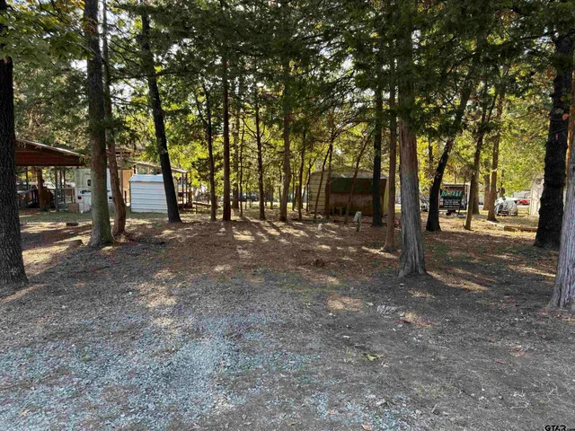 a view of road with trees