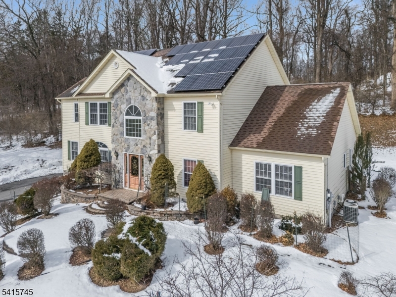 3 Elk Ridge Road Califon, NJ 07830 - Photo 14 of 15 a view of a house with yard and sitting area