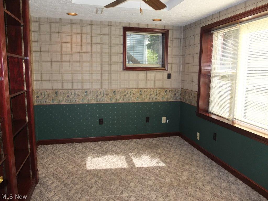 5891 Springlake Road Northwest Canton, OH 44718 - Photo 11 of 20 1st floor office with attached half bath and built in shelves.