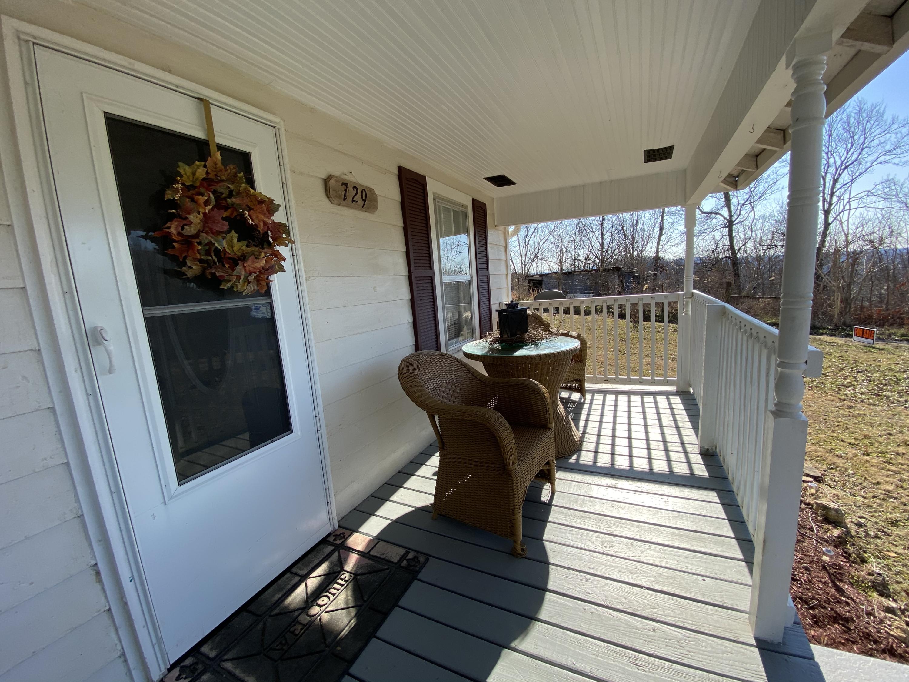 729 Dividing Ridge Road Speedwell, TN 37870 - Photo 8 of 27 Covered front porch