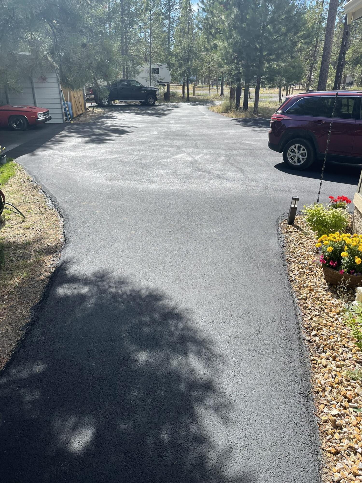 52648 Ammon Road La Pine, OR 97739 - Photo 38 of 44 a view of a yard with cars