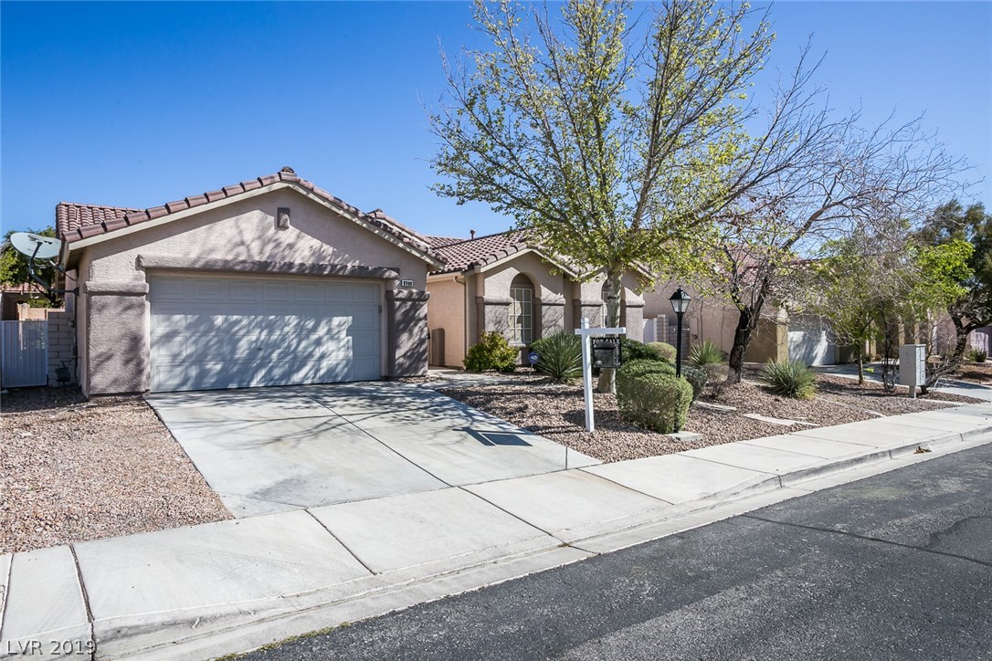 8908 Rusty Rifle Avenue Las Vegas, NV 89143 - Photo 1 of 19