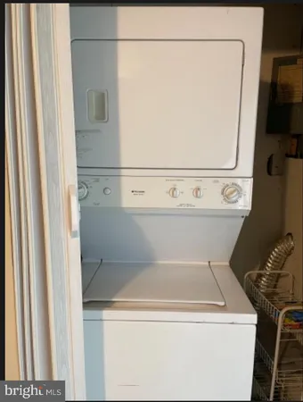 a bathroom with a sink a shower and a mirror