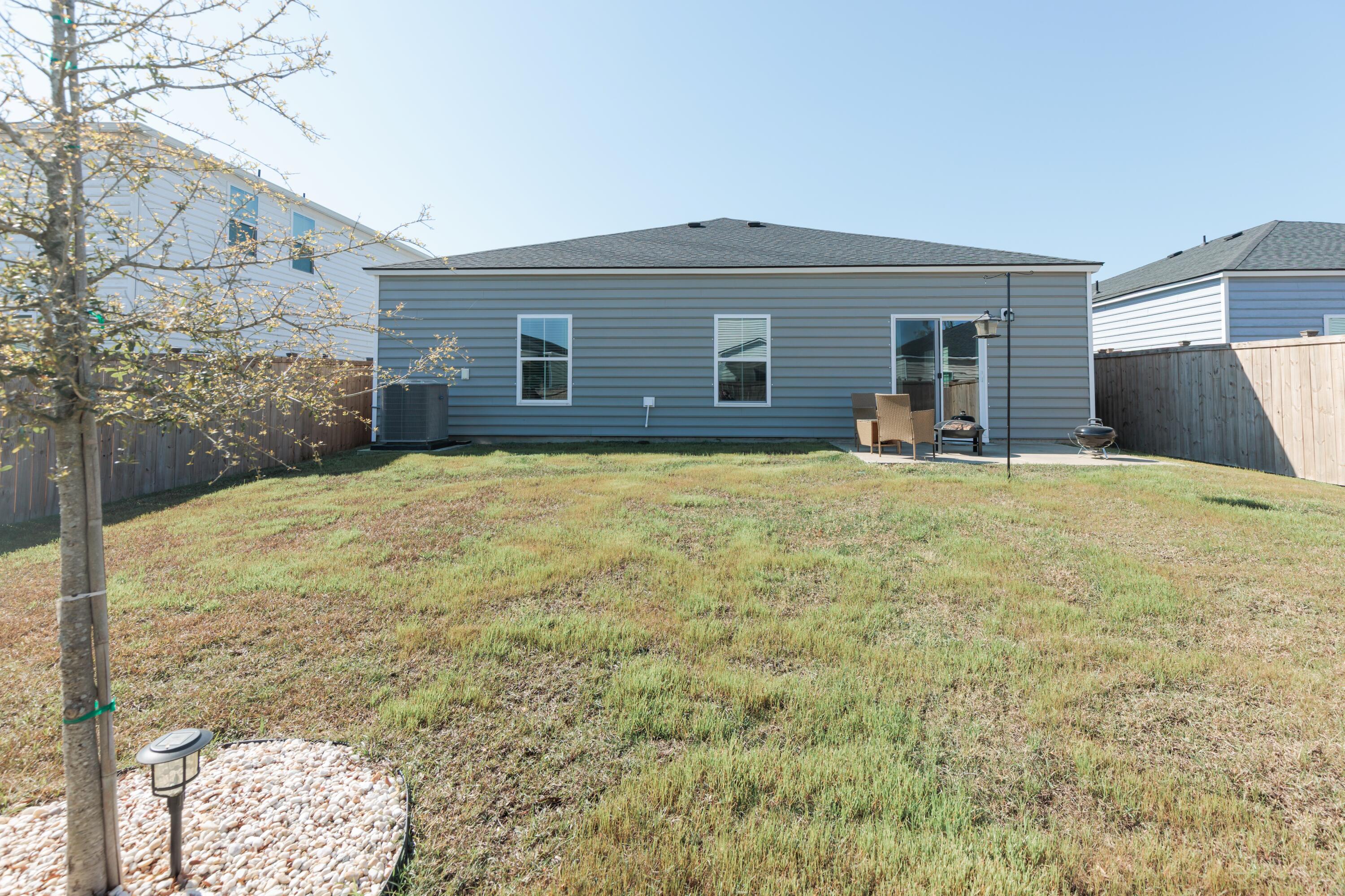 406 American Goldfinch Way Moncks Corner, SC 29461 - Photo 33 of 42 backyard 1