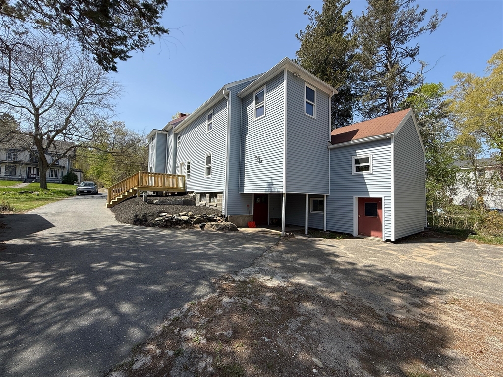 32 Main Street Monson, MA 01057 - Photo 4 of 42 a view of a house with a yard