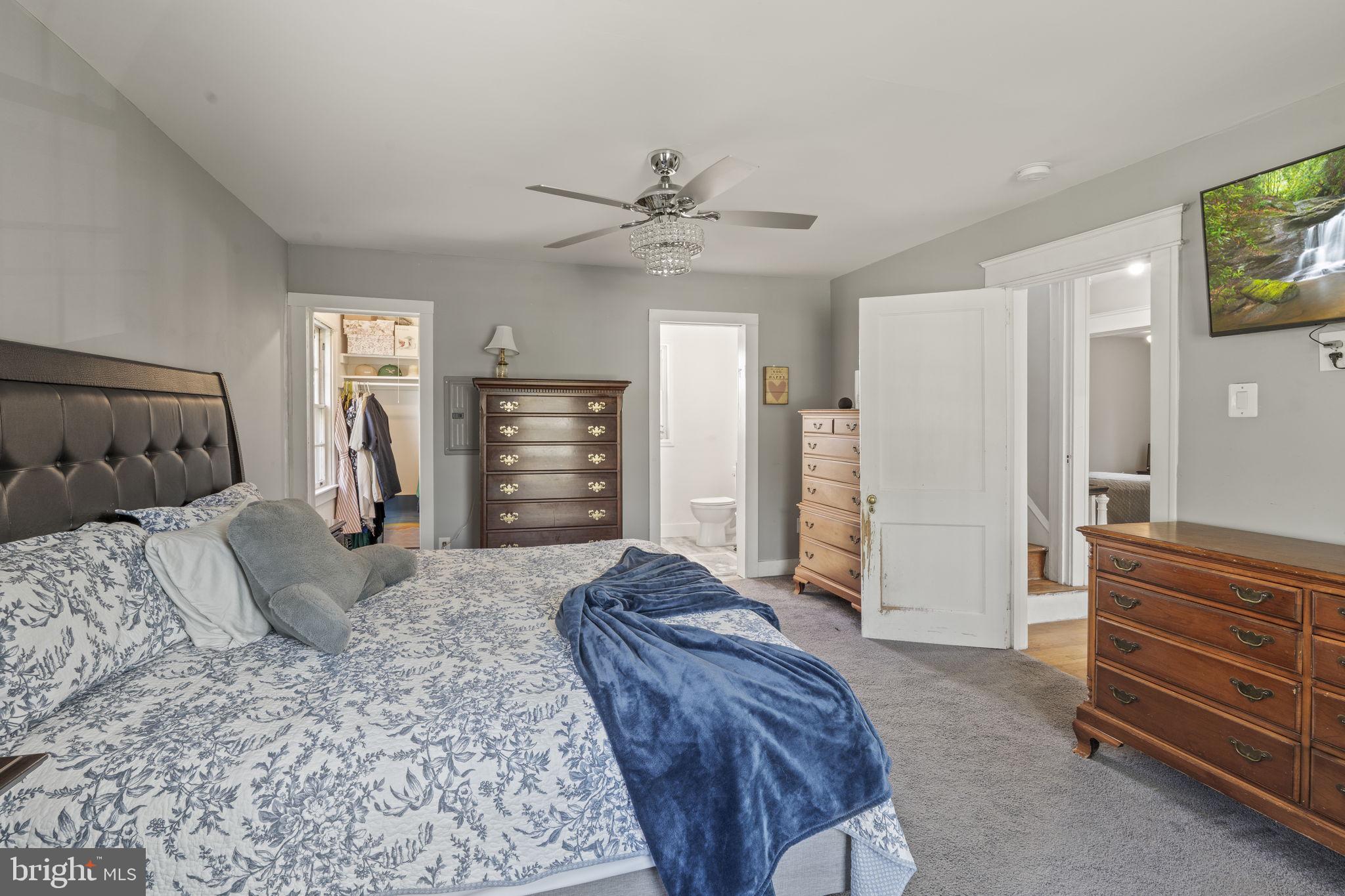 4161 Orchard Lane Philadelphia, PA 19154 - Photo 28 of 42 a spacious bedroom with a bed and a dresser