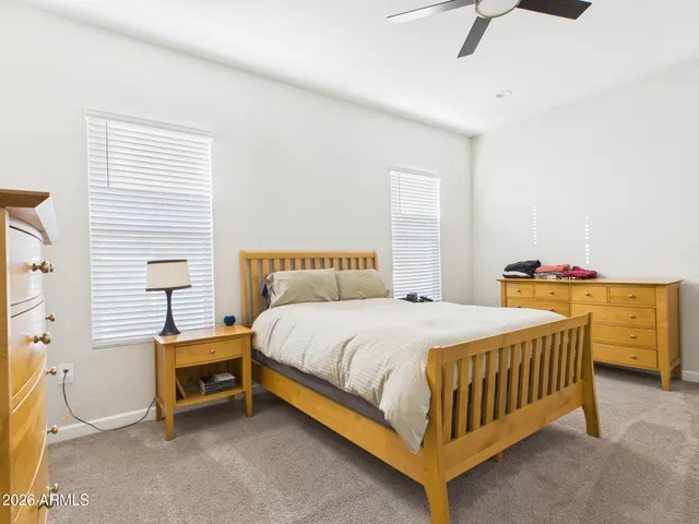 a bathroom with a sink vanity and a mirror