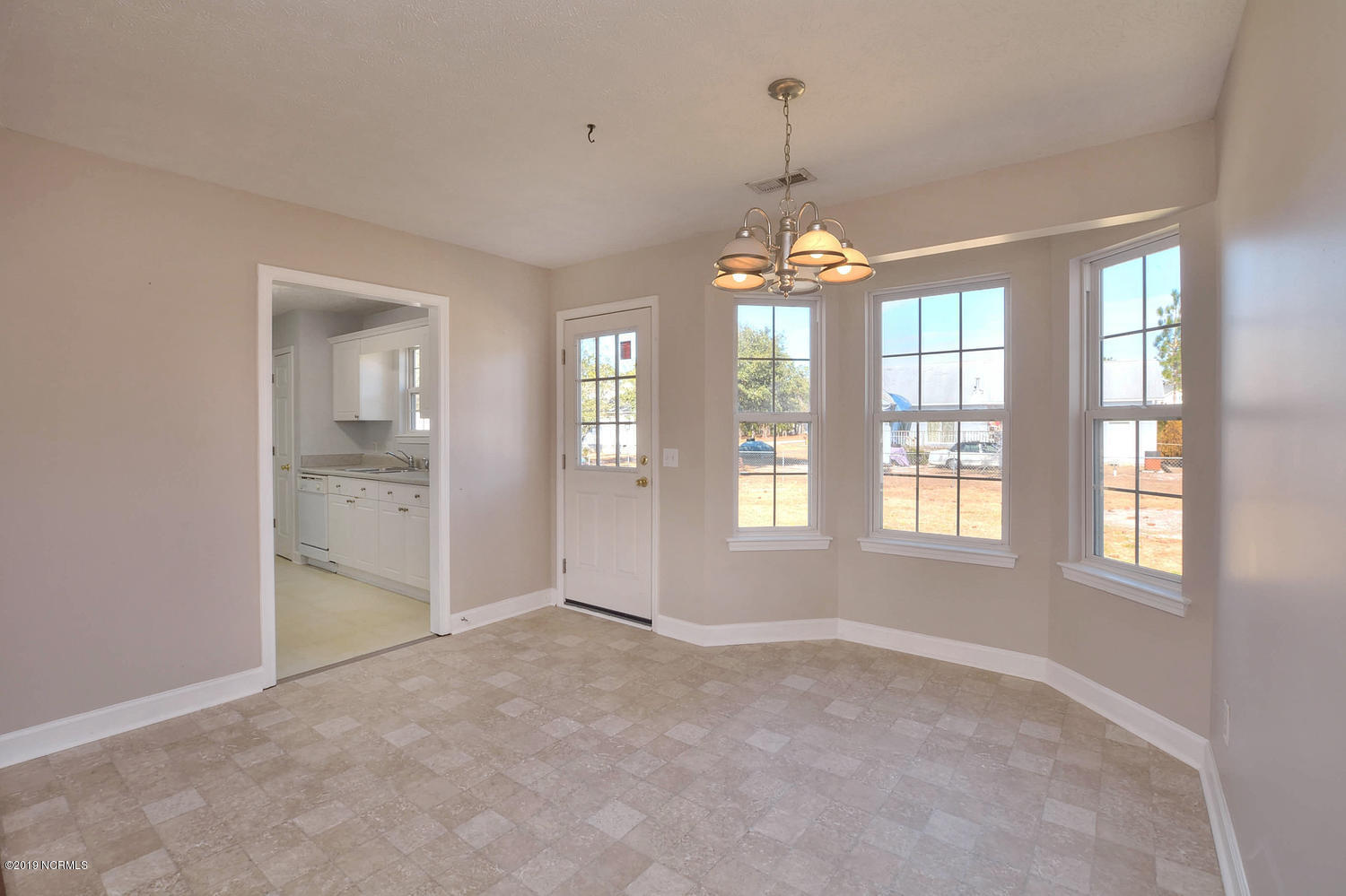 70 Greensboro Road Southport, NC 28461 - Photo 7 of 24 Dining Room and entrance to the kitchen