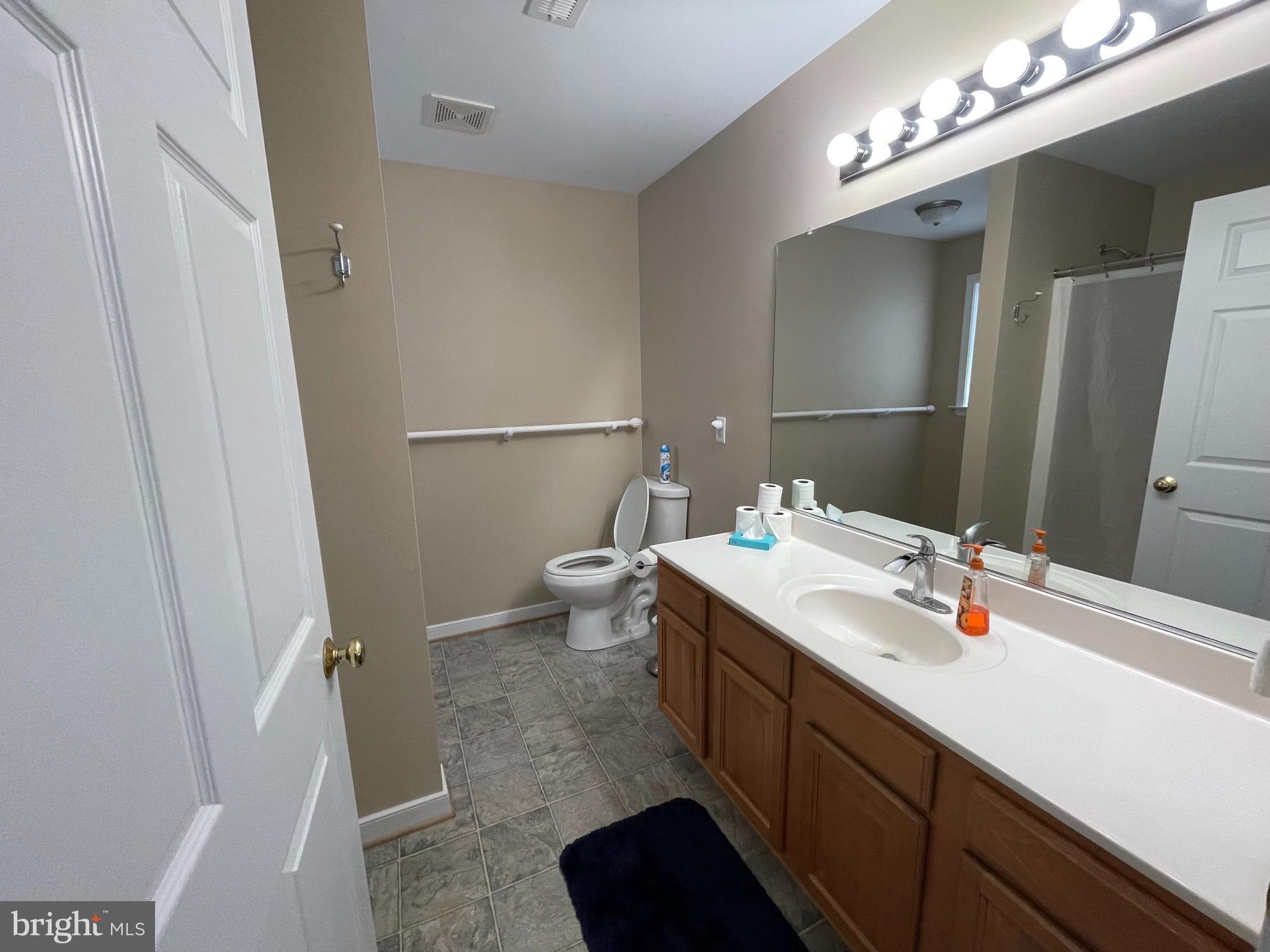 63 McCarty Road Fredericksburg, VA 22405 - Photo 24 of 38 Owner's Bedroom with wide accessible door