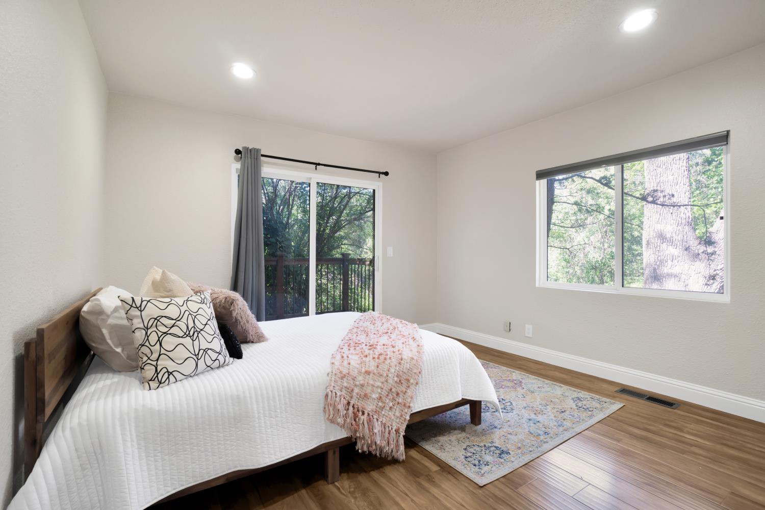 6299 Horseshoe Bar Road Loomis, CA 95650 - Photo 20 of 43 a bedroom with a bed and a window