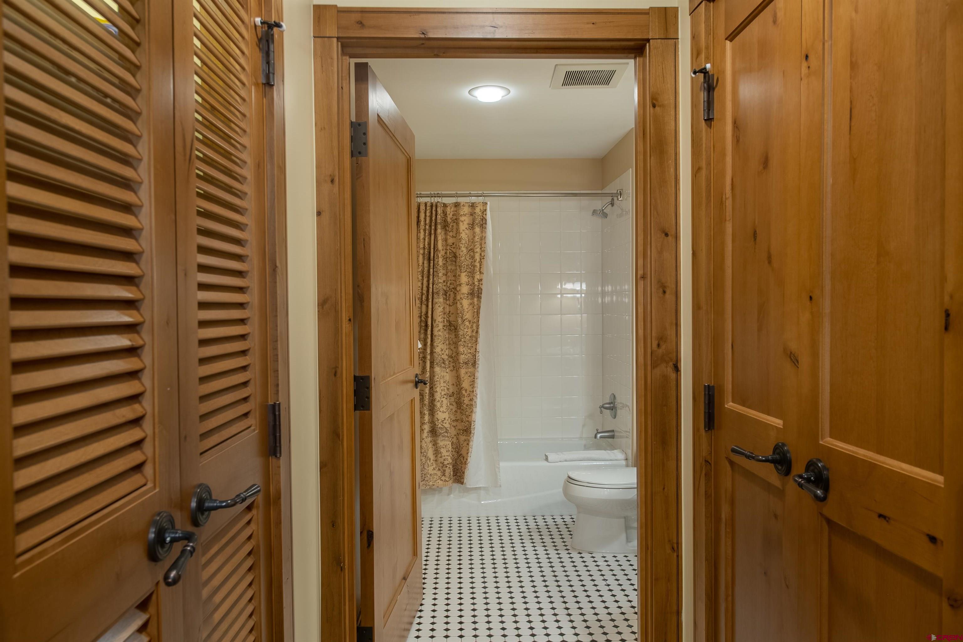 620 Gothic Road, Unit 504 Crested Butte, CO 81225 - Photo 18 of 33 a bathroom with a shower