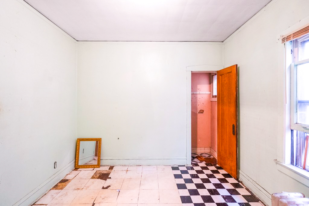 1627 North Long Avenue Chicago, IL 60639 - Photo 18 of 36 a bathroom with a shower and a window