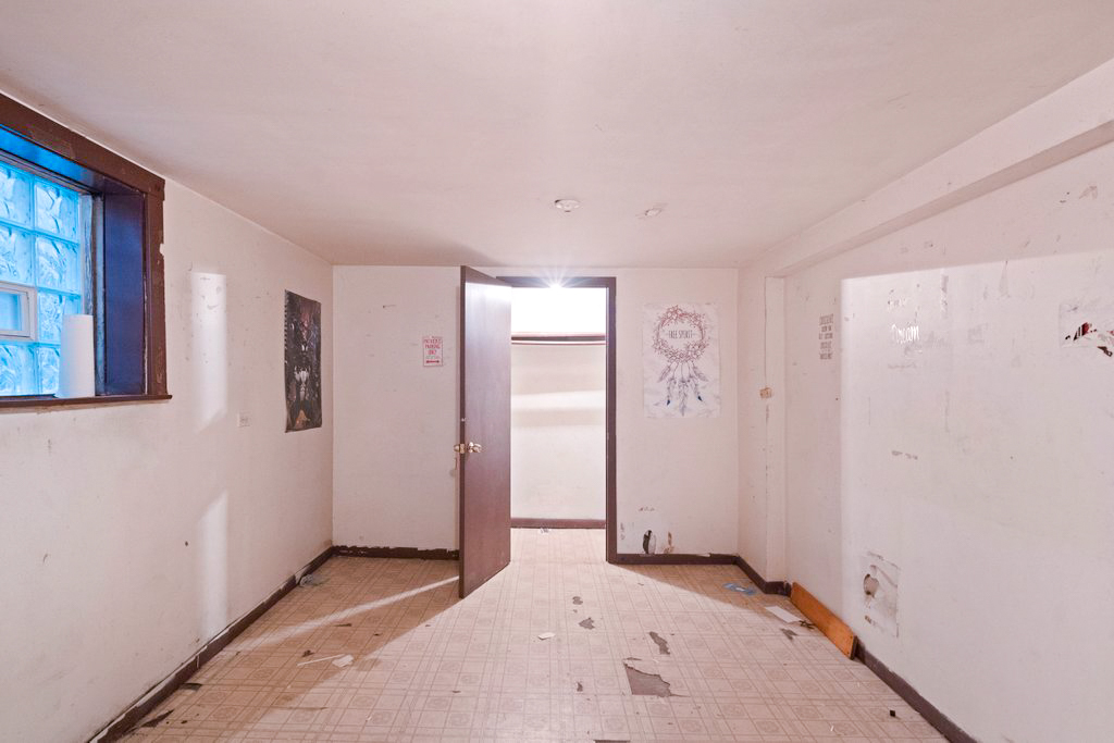 1627 North Long Avenue Chicago, IL 60639 - Photo 20 of 36 a view of livingroom with hardwood floor and hallway