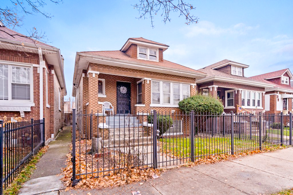 1627 North Long Avenue Chicago, IL 60639 - Photo 2 of 36 a view of a house with balcony