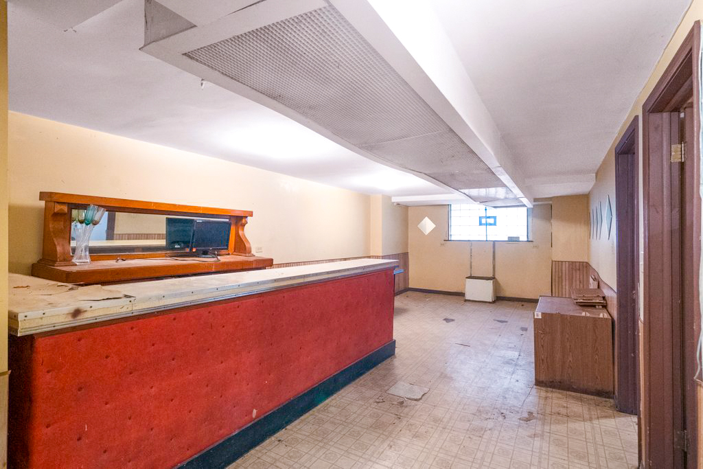1627 North Long Avenue Chicago, IL 60639 - Photo 27 of 36 a view of a kitchen with furniture and staircase