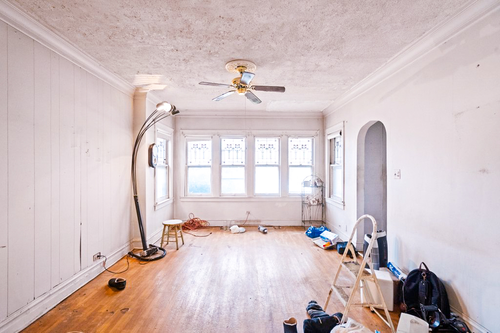 1627 North Long Avenue Chicago, IL 60639 - Photo 5 of 36 a view of a room with gym equipment