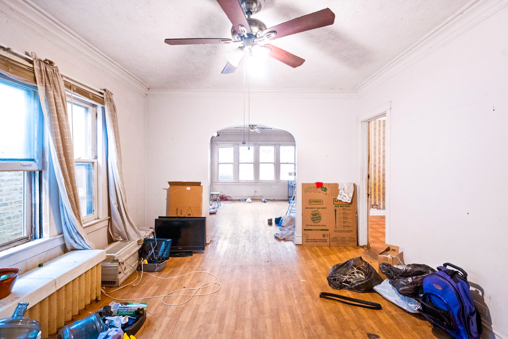 1627 North Long Avenue Chicago, IL 60639 - Photo 6 of 36 a bedroom with furniture and a window