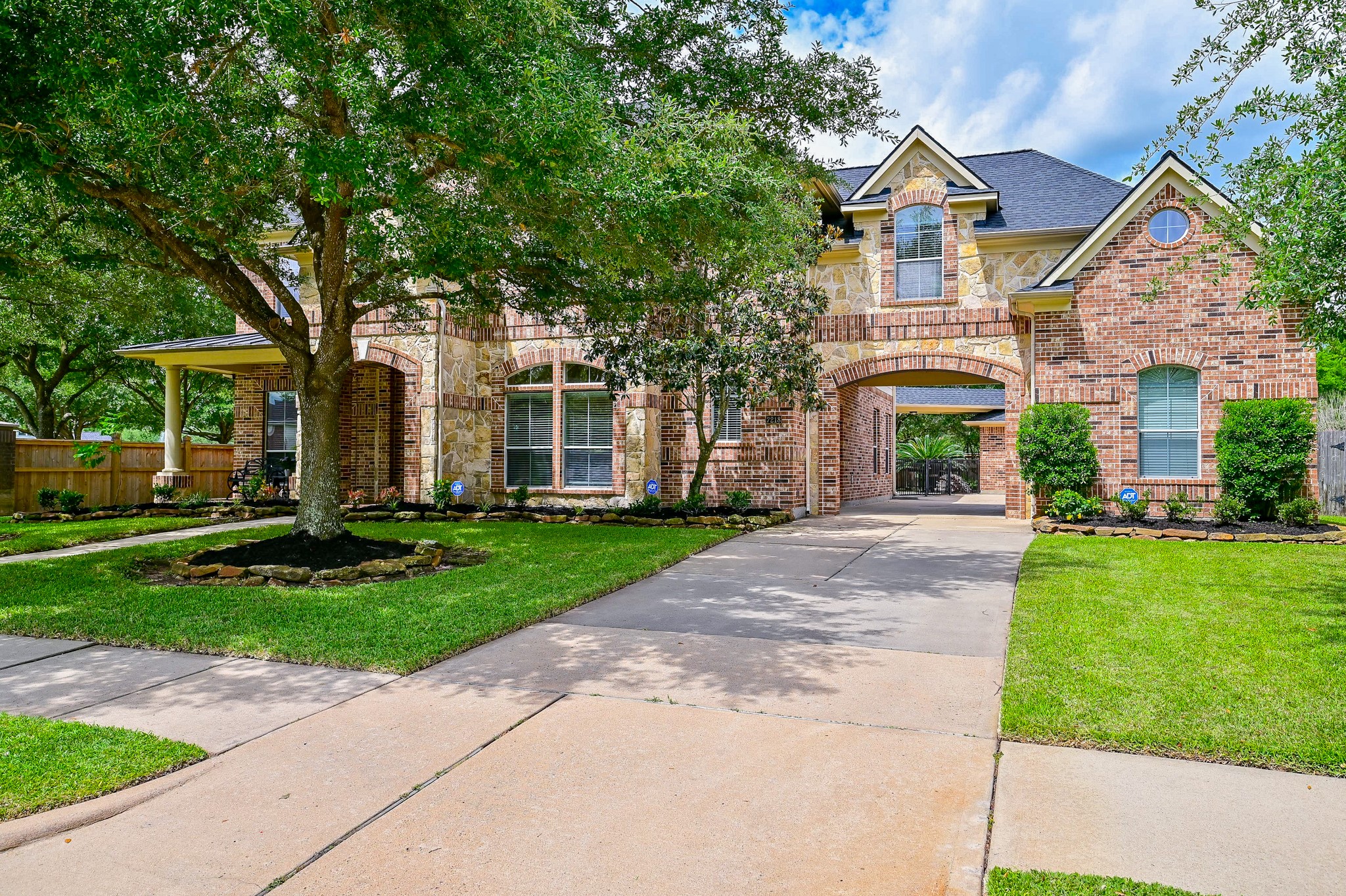 7218 Spring Run Lane Katy, TX 77494 - Photo 2 of 49 front view of a house with a yard