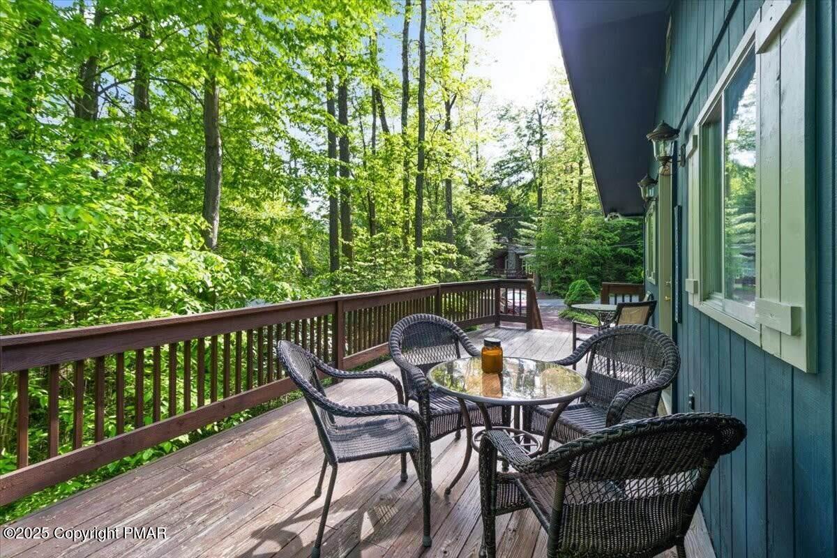 102 Sweet Briar Road Pocono Pines, PA 18350 - Photo 20 of 21 a view of a chairs and table in the balcony