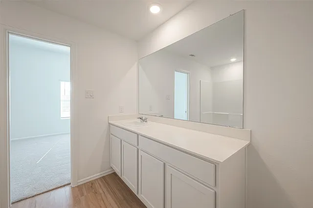 a utility room with a sink dryer and washer