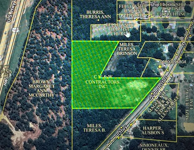 a view of a yard from a balcony