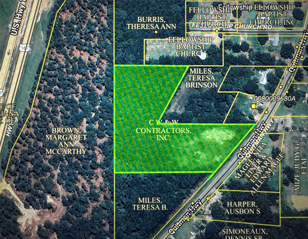 a view of a yard from a balcony