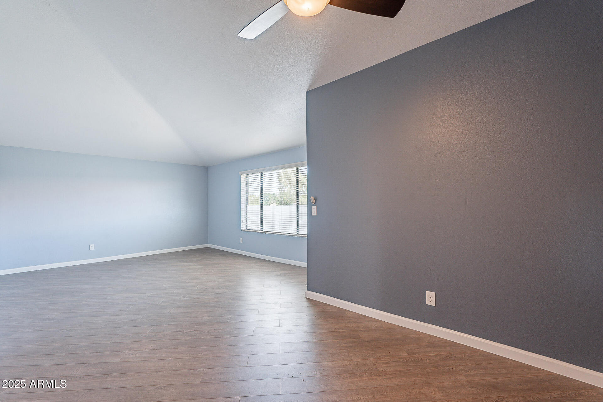 1402 East Guadalupe Road, Unit 207 Tempe, AZ 85283 - Photo 14 of 33 wooden floor in an empty room with a window