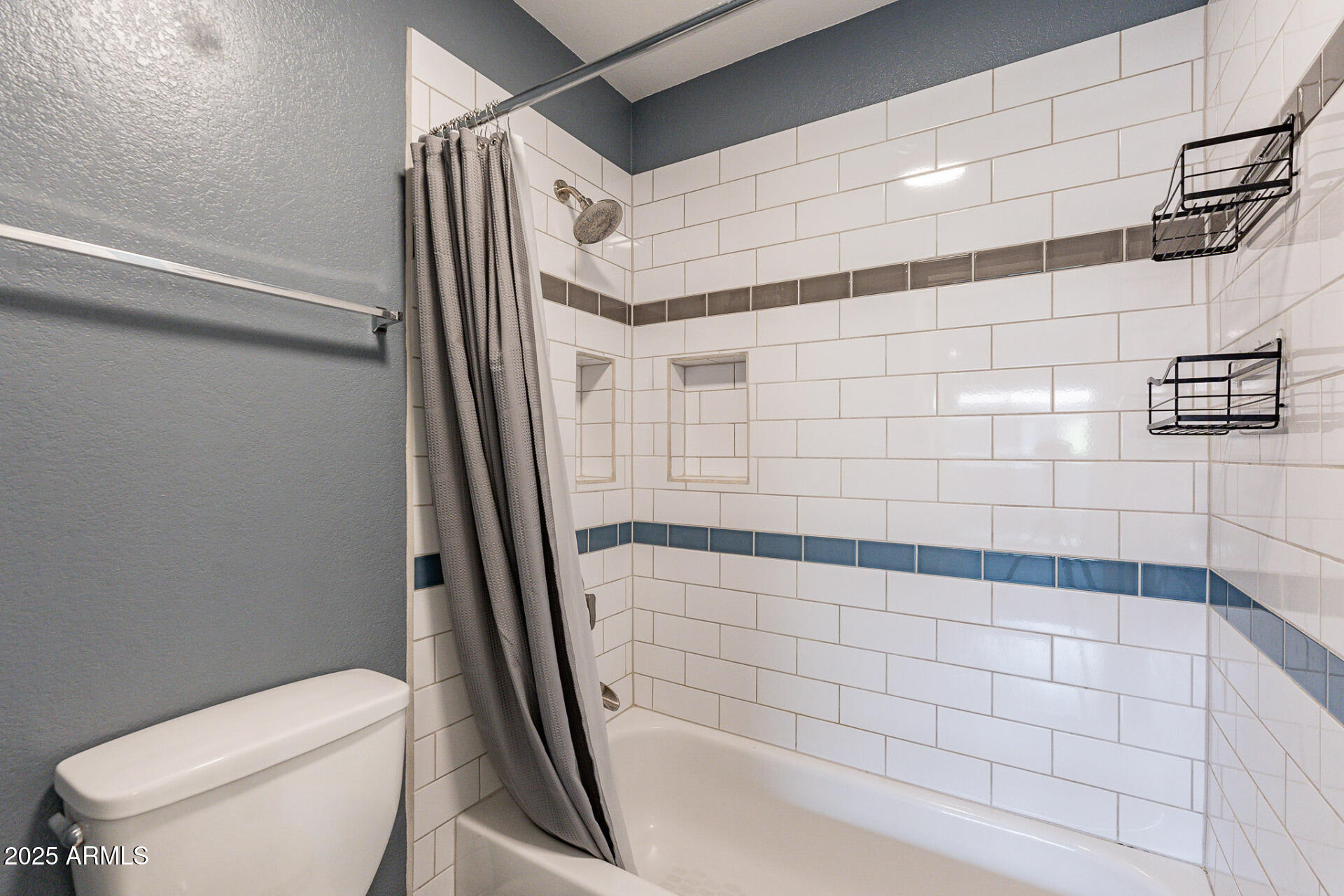 1402 East Guadalupe Road, Unit 207 Tempe, AZ 85283 - Photo 21 of 33 a bathroom with a toilet and a shower