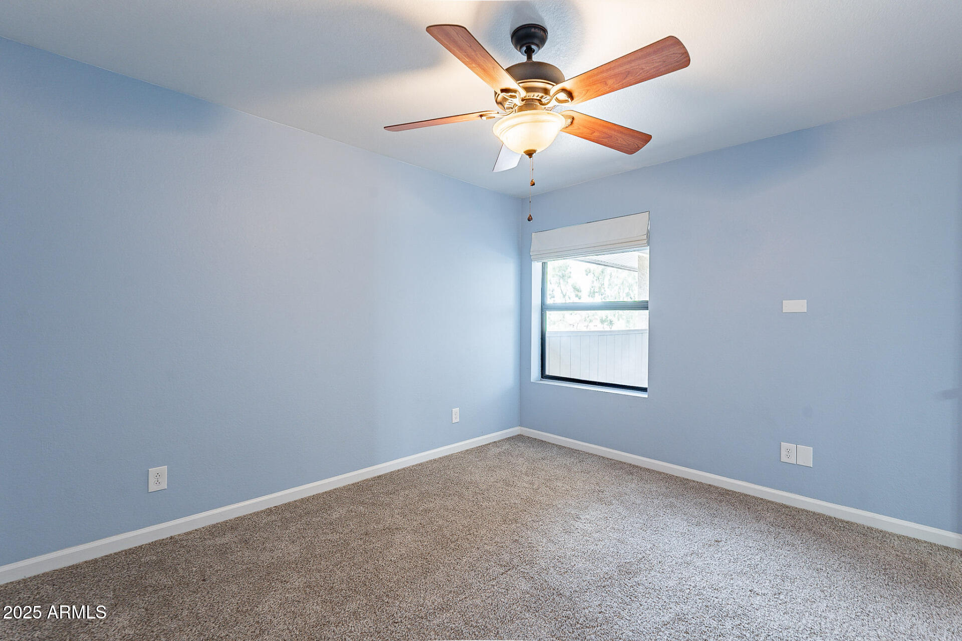 1402 East Guadalupe Road, Unit 207 Tempe, AZ 85283 - Photo 25 of 33 an empty room with a window