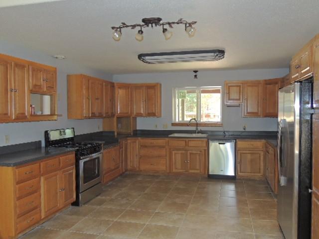 Kitchen has stainless steel appliances