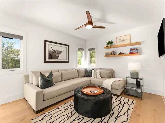 a living room with furniture and a window