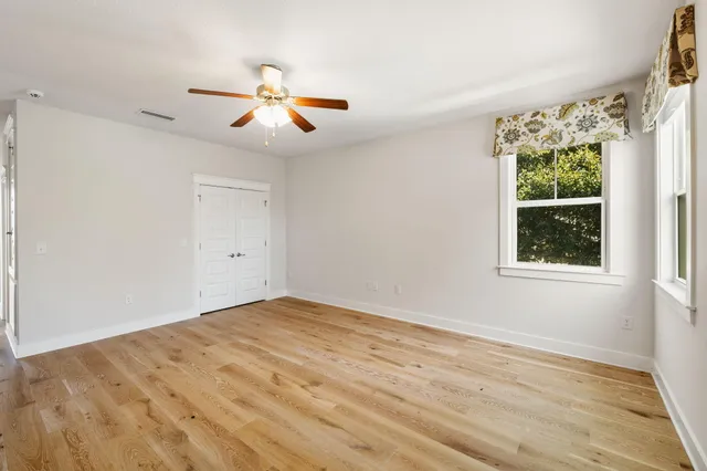 a bathroom with a tub a sink and a shower