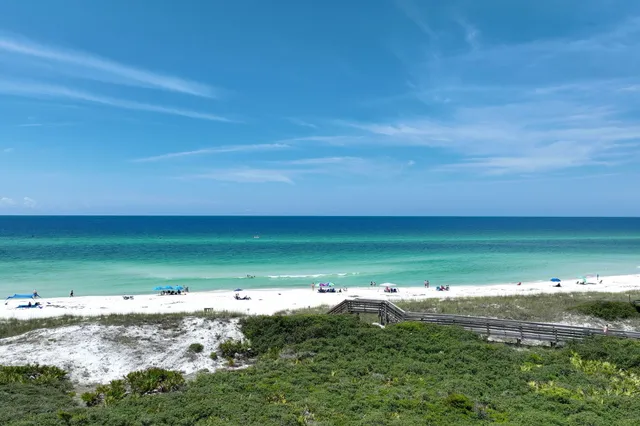 an aerial view of a house having yard