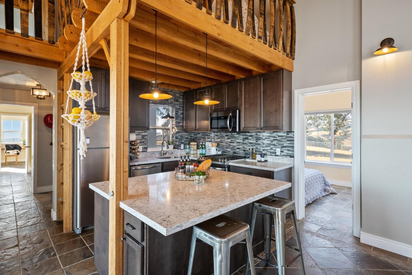 16650 Finley Ridge Road Morgan Hill, CA 95037 - Photo 15 of 85 a kitchen with a table and chairs